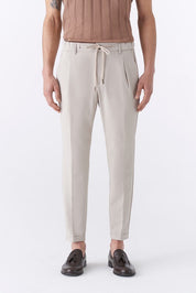 Pantalone jogger spigato con elastico in vita