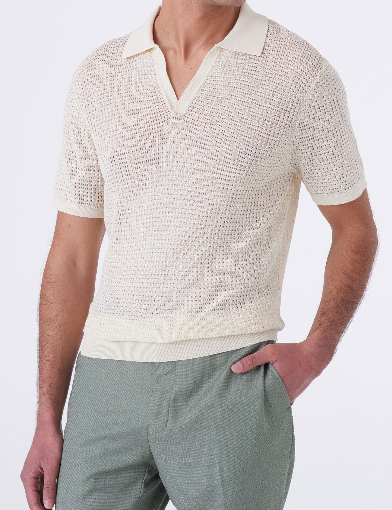 Polo traforata con collo bowling