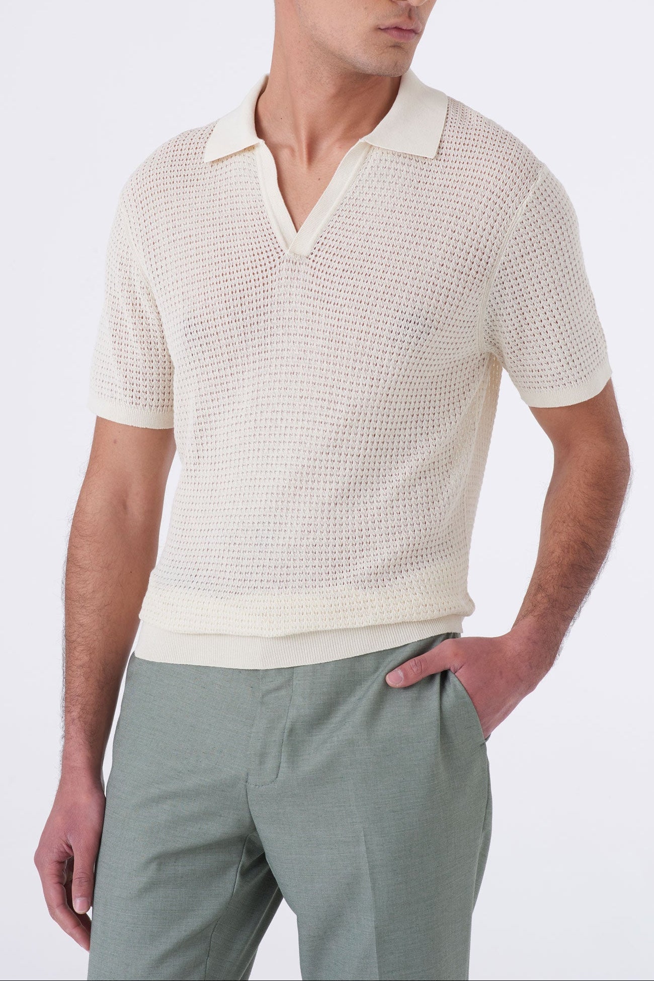 Polo traforata con collo bowling