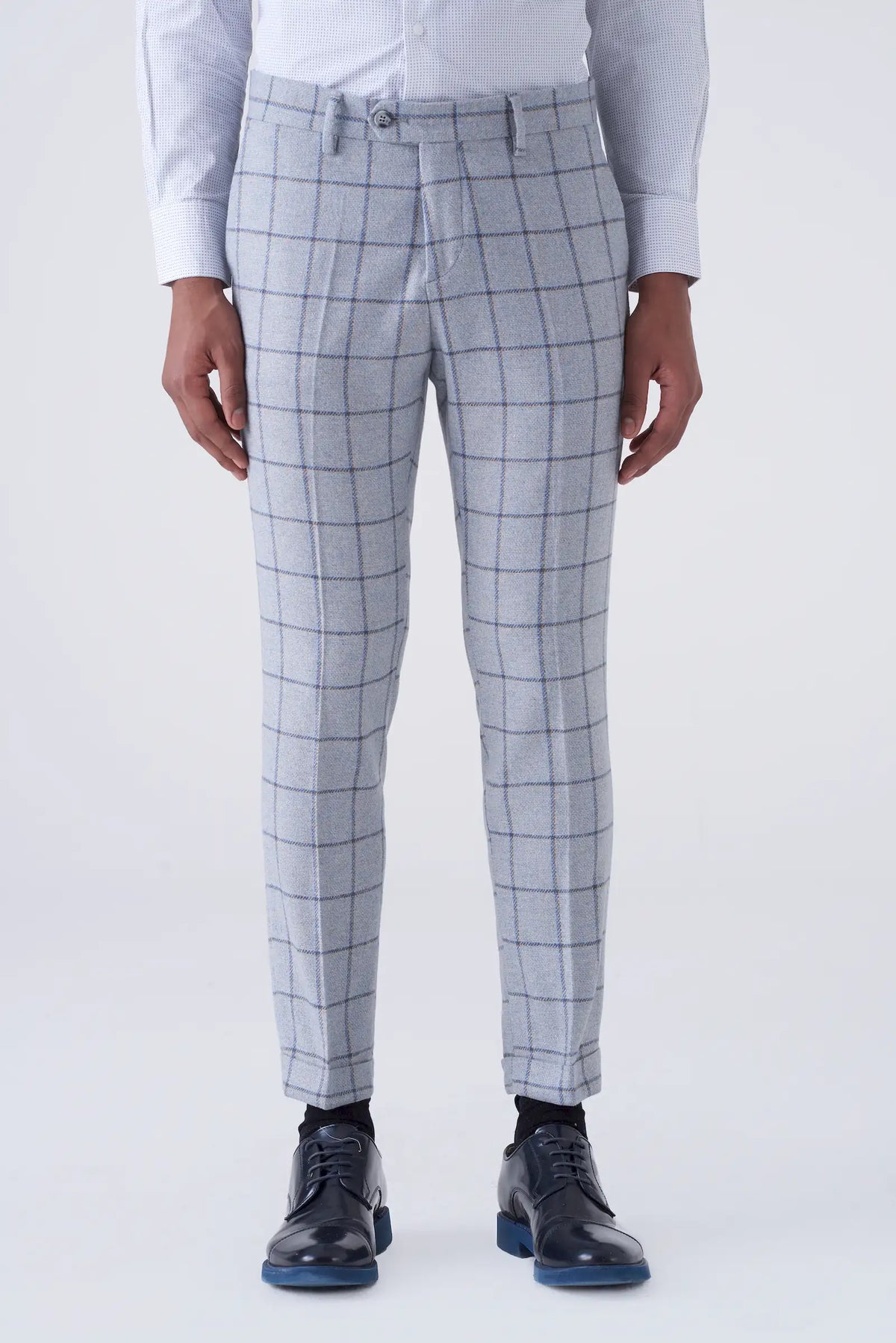 Pantaloni grigio chiaro fantasia a quadri