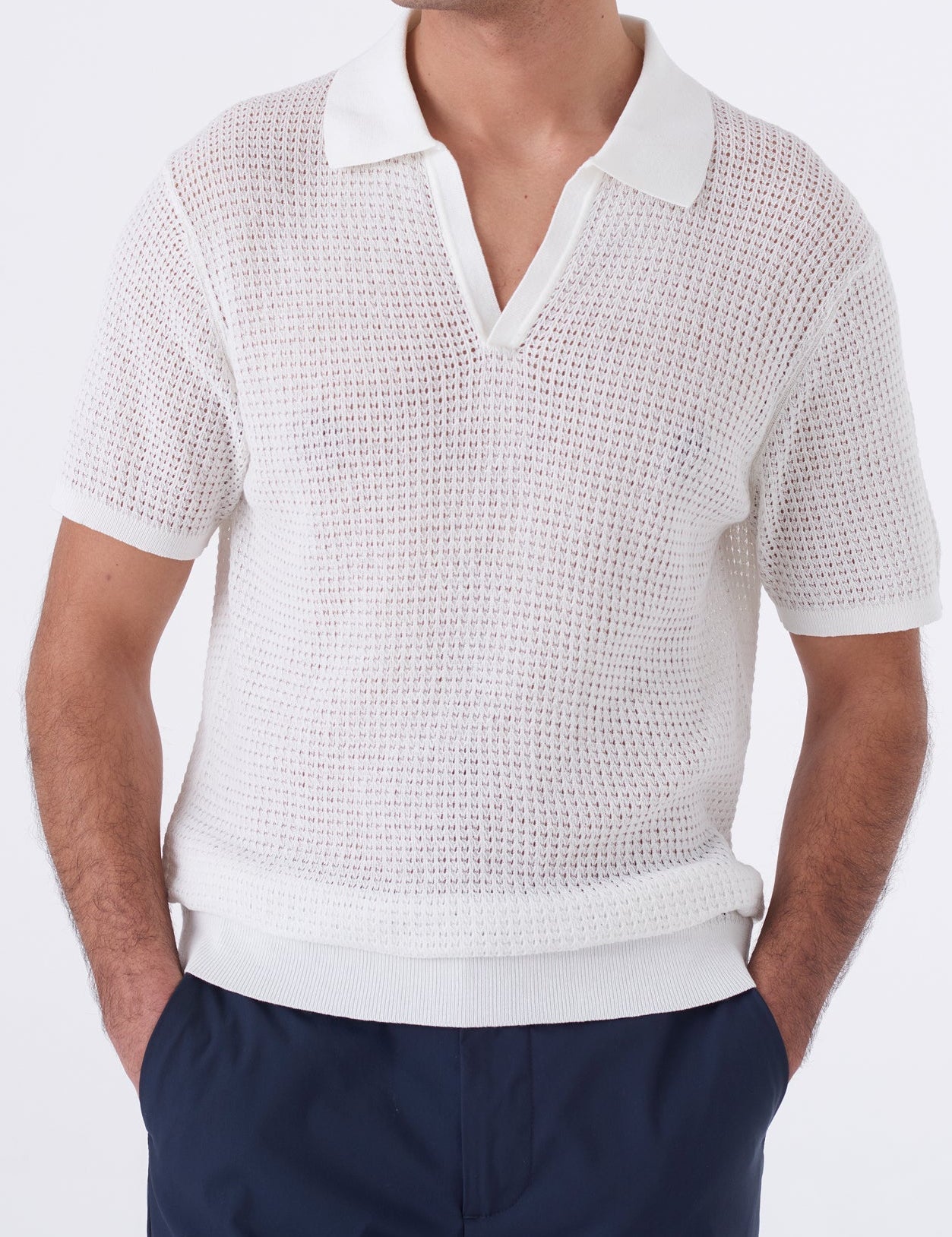 Polo traforata con collo bowling