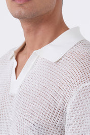 Polo traforata con collo bowling