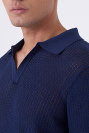 Polo traforata con collo bowling
