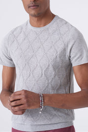 Maglia in filo con intarsio a rombo